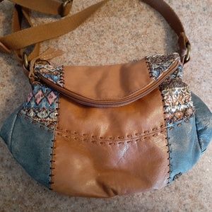 The Sak hobo  leather crossbody handbag.